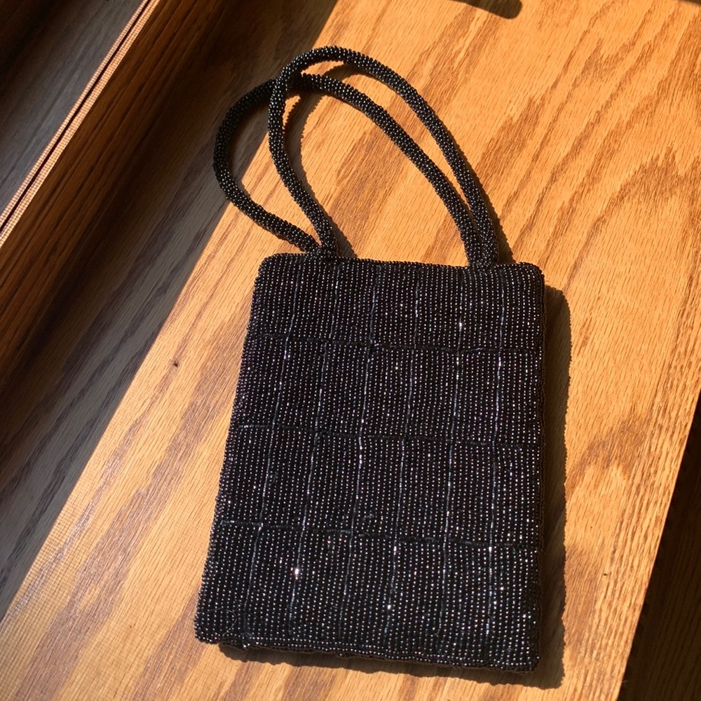 Clutch purse , black like New . Beaded